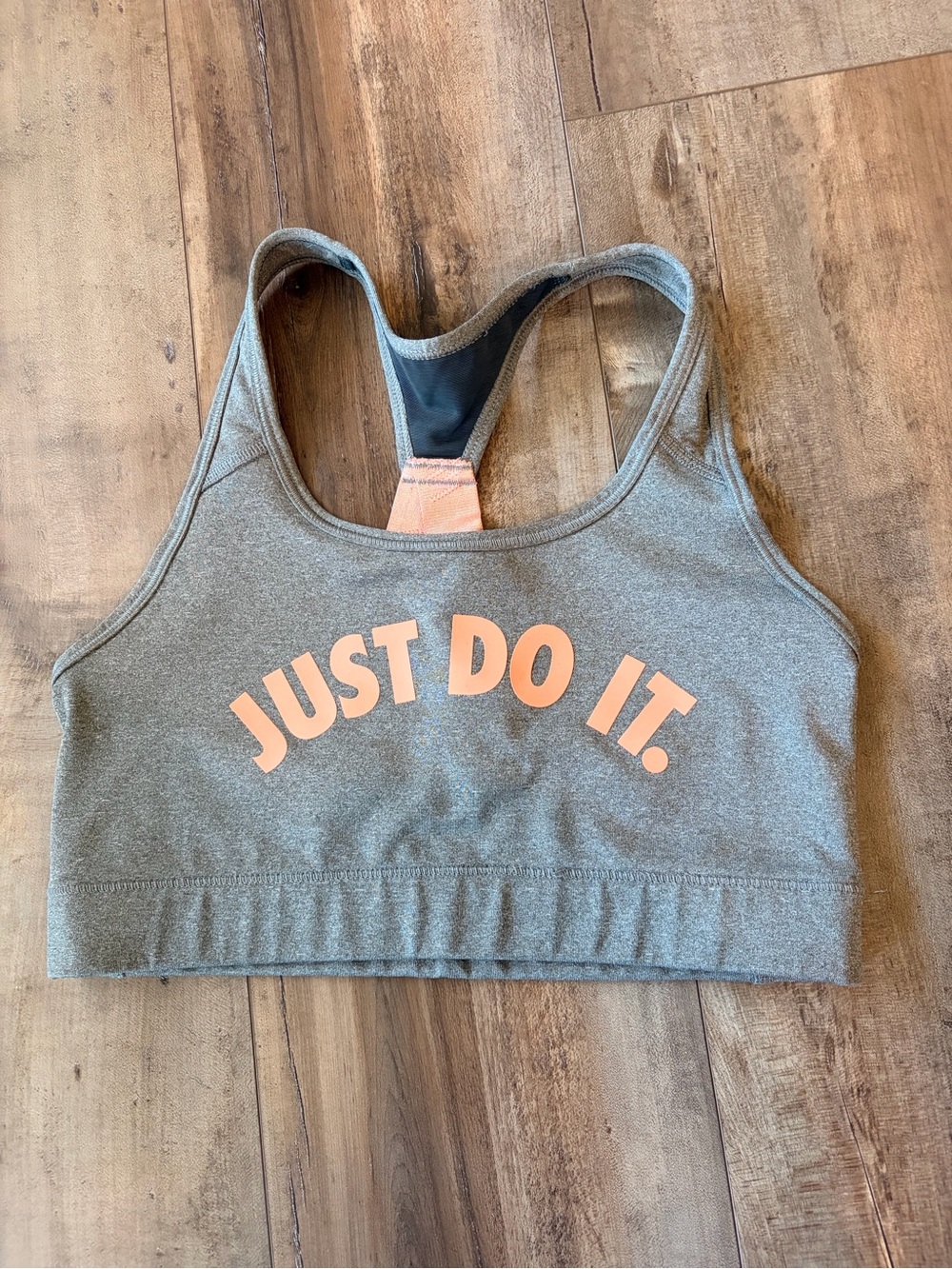 Grey heather Nike victory support sports bra with peach just do it logo. Size m